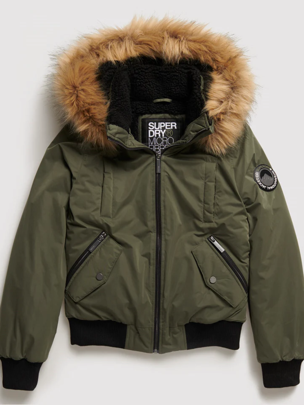 Kort grön Superdry vinterjacka för kvinnor