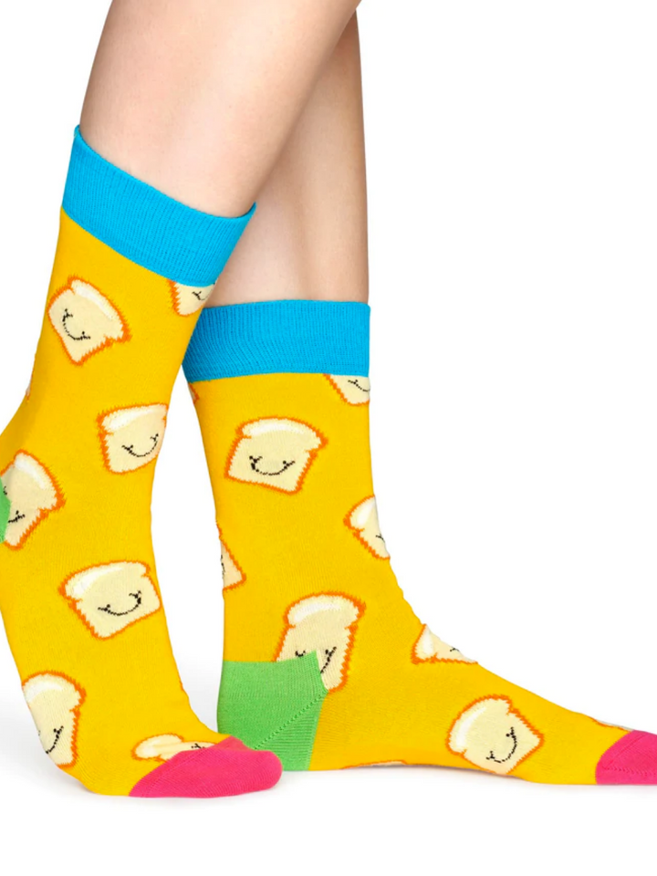 Orange Happy Socks med rostat bröd för honom och henne
